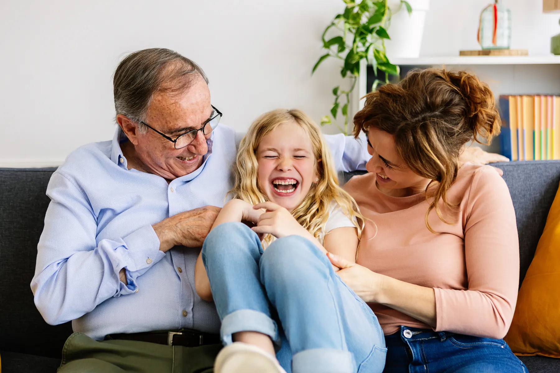 Family laughing together at home