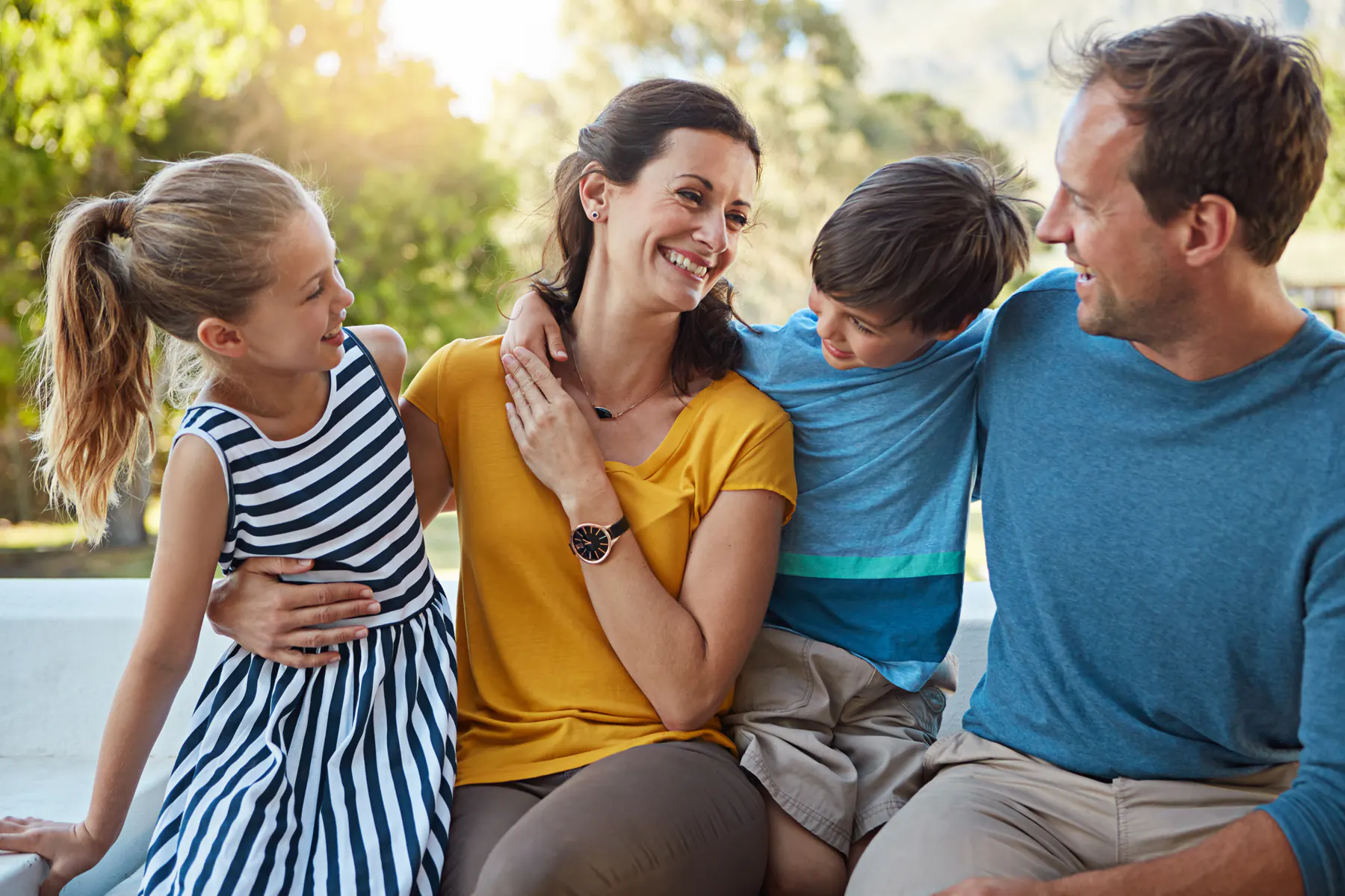 Family smiling together outdoors