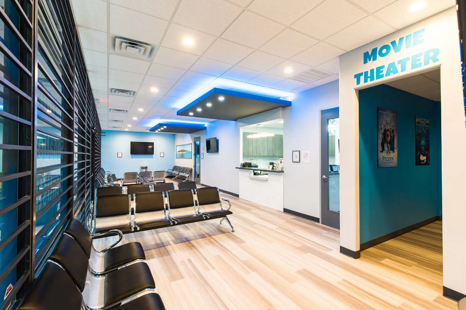 Fresca Dental waiting area beside the entrance to the movie theater